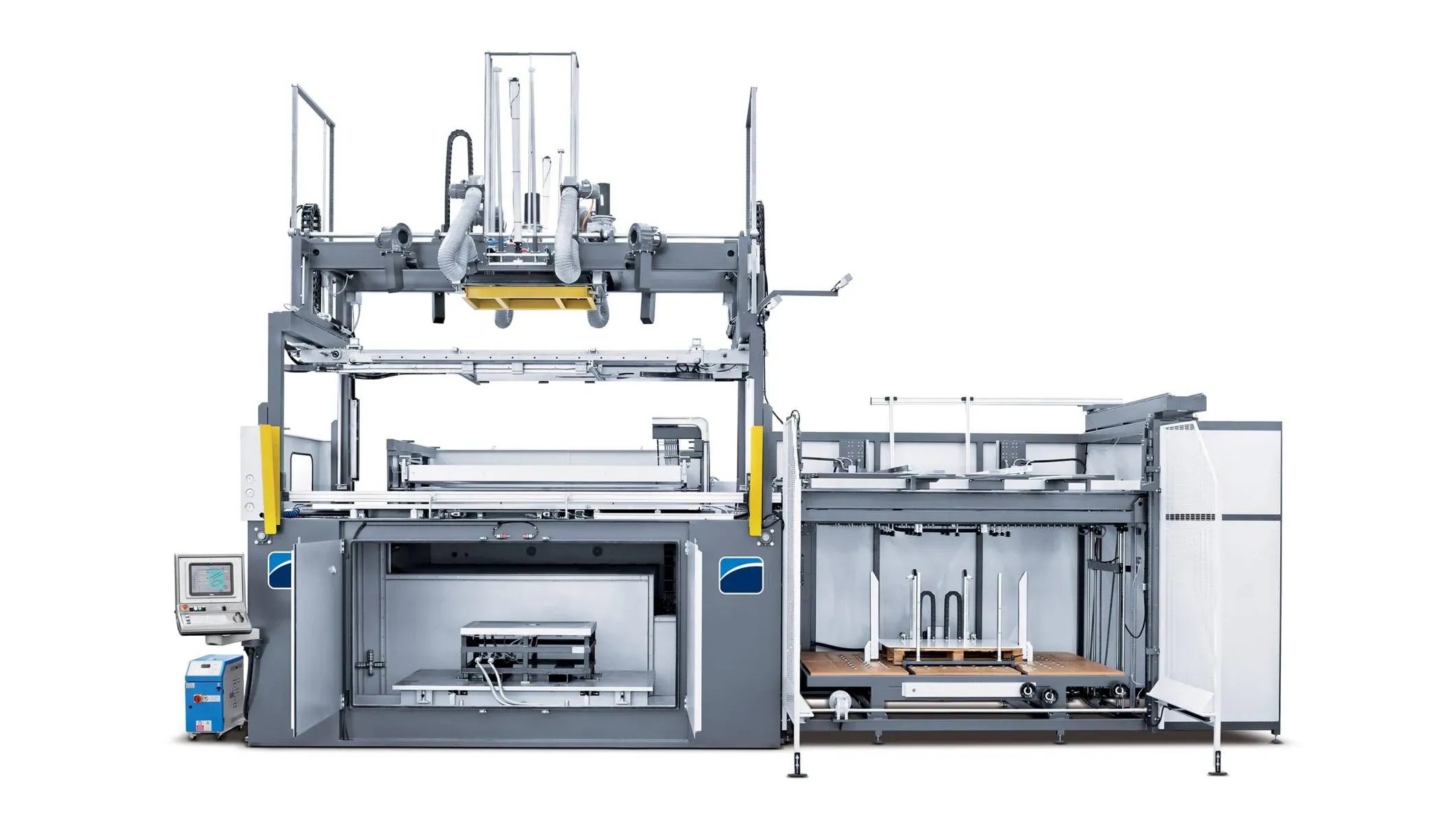 Advanced thermoforming machine with a large forming area, control panel, and sheet feeding system, designed for high-efficiency plastic molding.