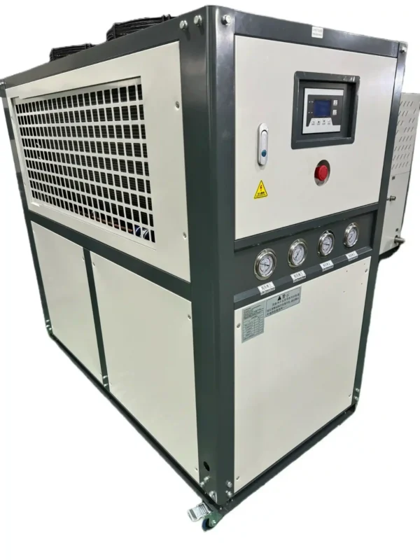 A compact industrial water chiller with a digital control panel and gauges on the front.