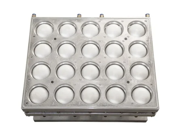 A metal upper punching mold with multiple circular cavities, designed for producing cup lids through thermoforming.