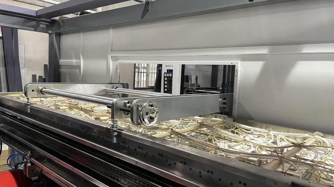 Thermoforming machine on a factory production line.