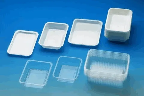 Various types of disposable plastic containers on a blue background.
