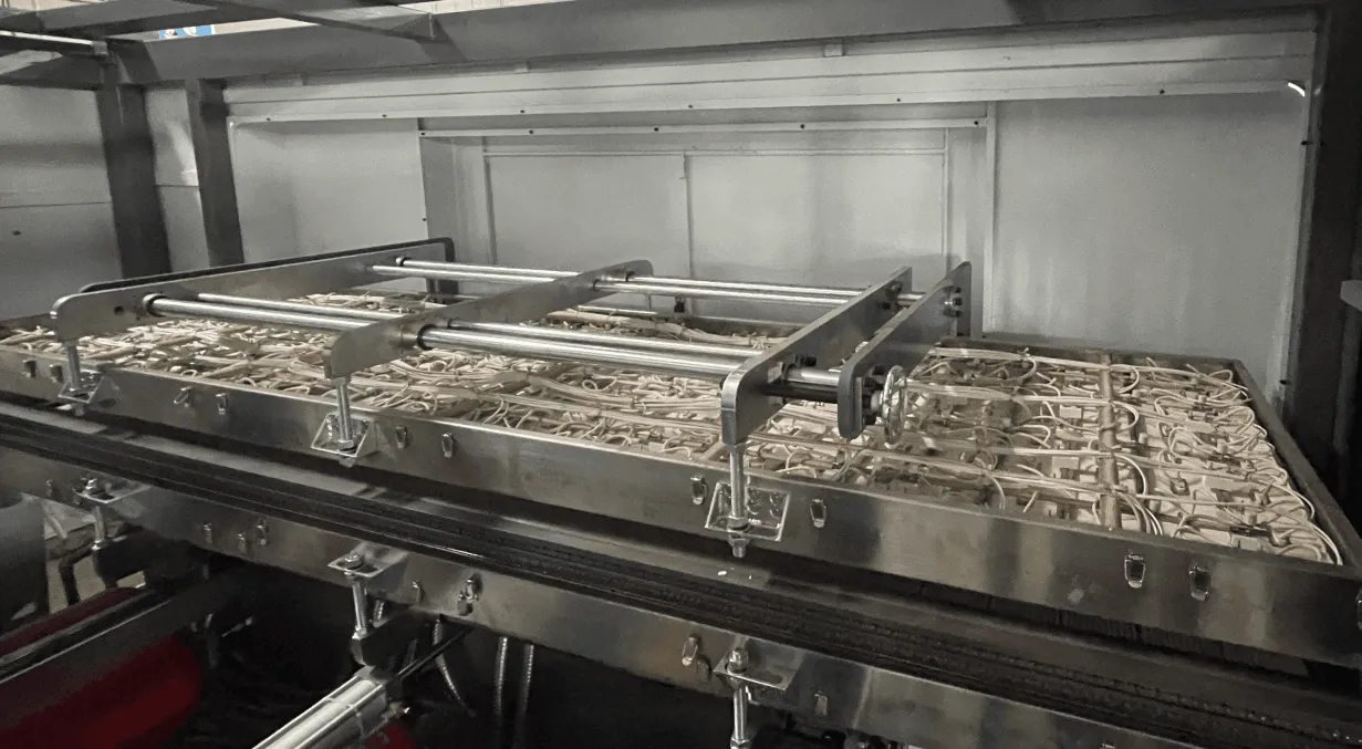 Inside view of a plastic thermoforming machine.