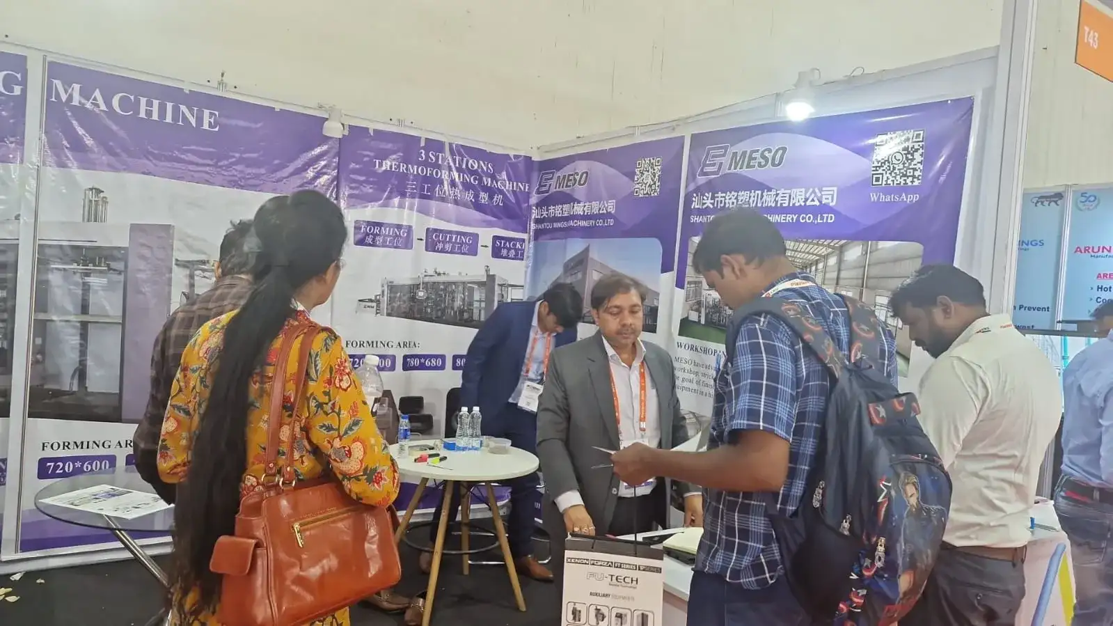 Mesoforming sales team discussing with Indian customers at PlastFocus India Plast 2025 New Delhi