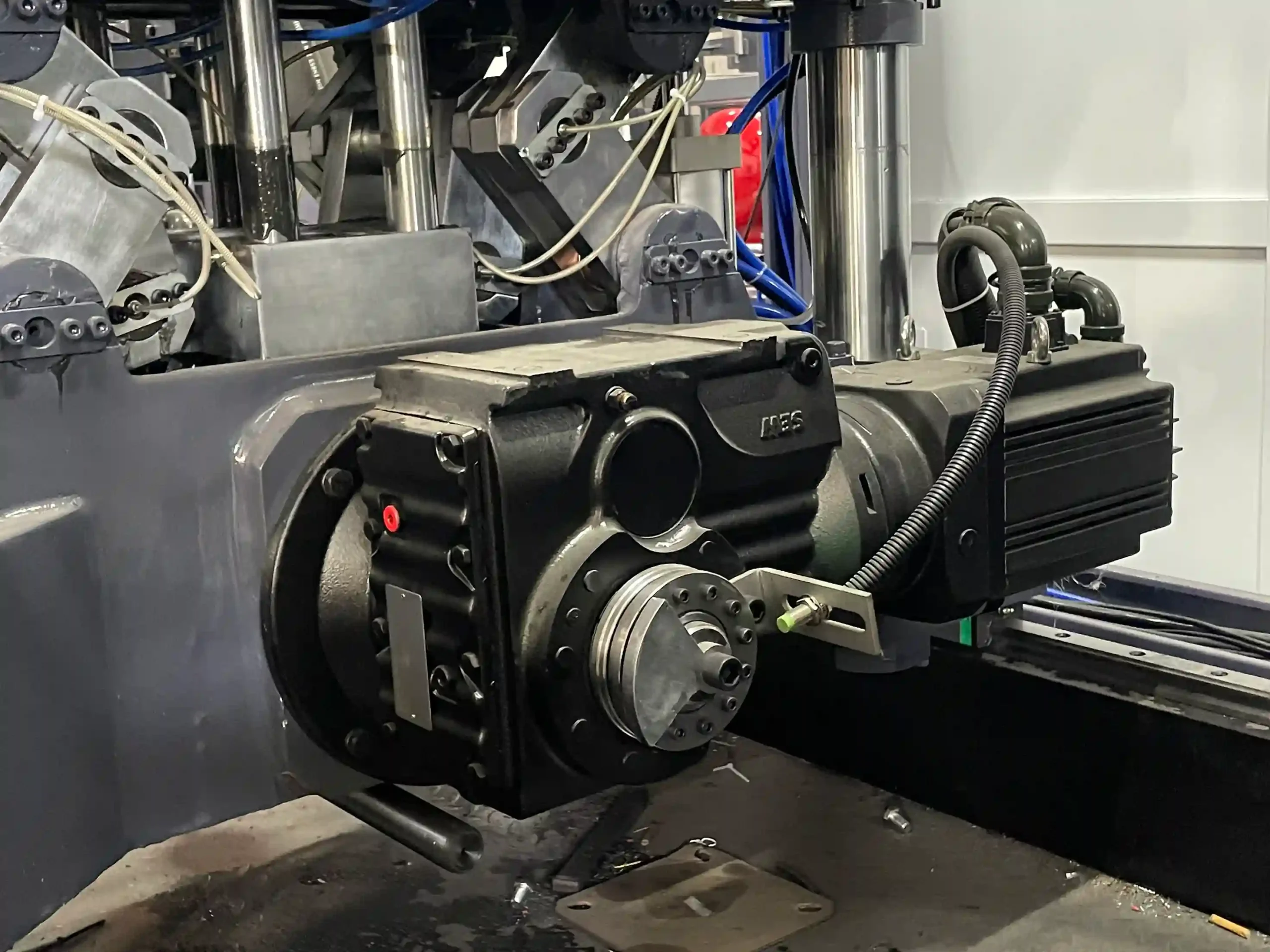 Mesoforming machinery with integrated SEW gear motor and servo drive.